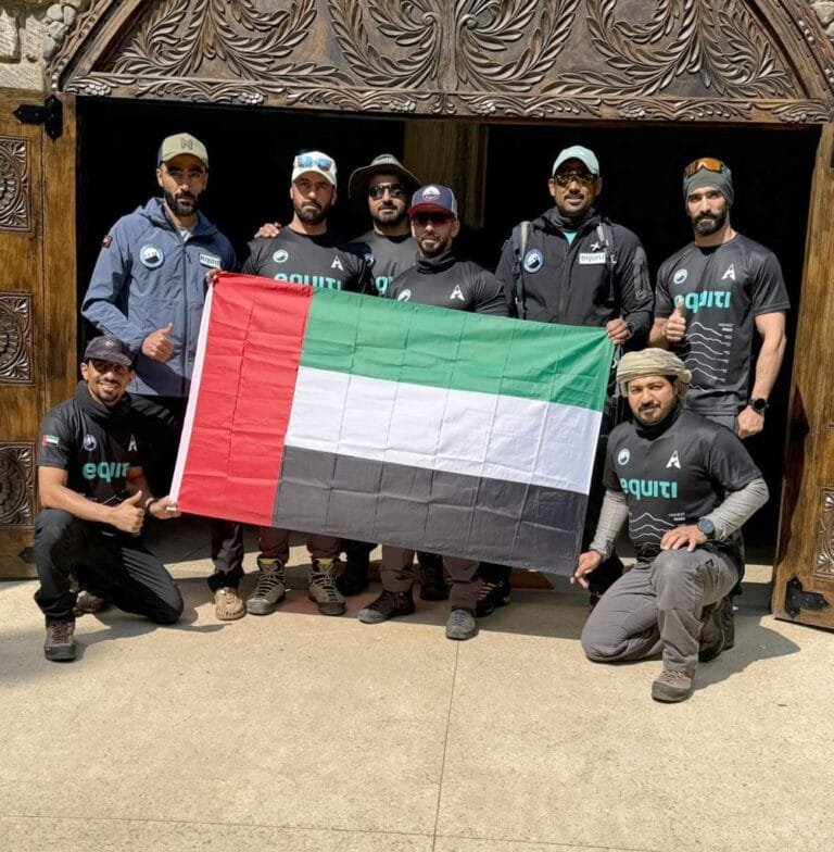 Emirati youth raise their country's flag at the top of Kilimanjaro, the highest in Africa
