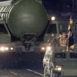 Pictures.. Kim Jong Un unveils the Hwasong-20 ballistic missile