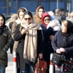 Iran threatens to enforce stricter laws against practices that violate hijab and involve nudity