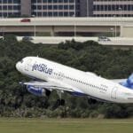Airbus lowers its 2025 delivery target due to quality issues with its A320 aircraft.