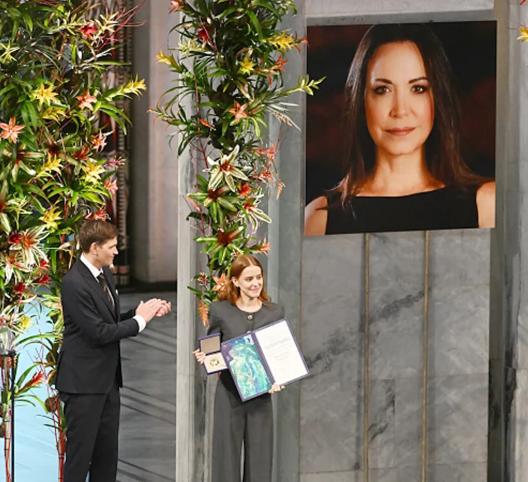 The daughter of Venezuelan activist Maria Corina Machado accepts the Nobel Peace Prize on her behalf