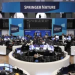 Cautious calm prevails in European markets; technology and mining support stability after record highs.