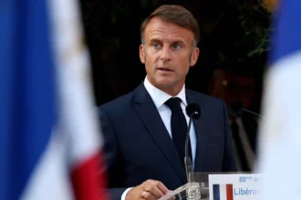 How did French President Macron comment on the burial of the last Israeli hostage in Gaza?