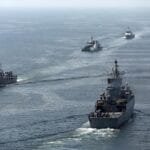 China demands that the United States guarantee freedom of navigation in international waters.