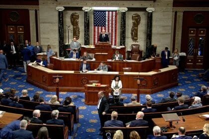Despite the looming threat of a partial shutdown, the US Senate passes a spending bill, temporarily saving the government.