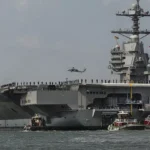 The US aircraft carrier "Gerald Ford" is heading to Haifa for port amid escalating tensions with Iran.