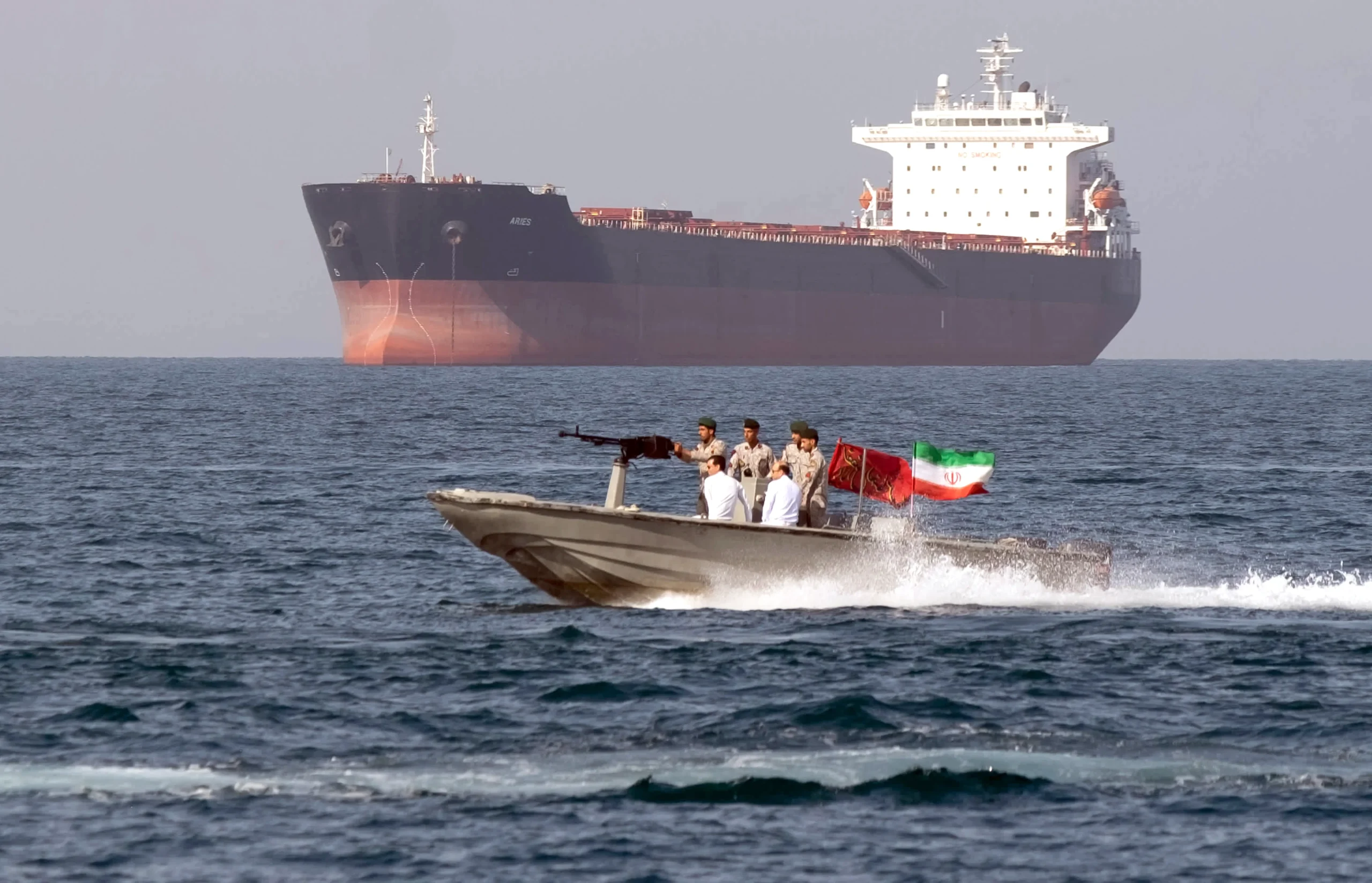 Iranian armed boats approach a US oil tanker in the Strait of Hormuz and demand it stop