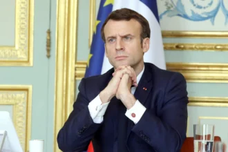 Macron calls for calm after activist dies following attack outside political conference