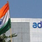 India's Adani Group is cooperating with the United States in an investigation into possible violations of sanctions against Iran.
