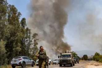 Israeli raid kills a leader in Sidon and Hezbollah responds by shelling Nahariya with rockets