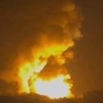 Smoke rising after explosion at ammunition depot in Isfahan Iran.