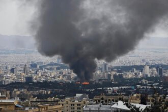 Launching Tomahawk missiles from American warships towards targets in Iran.