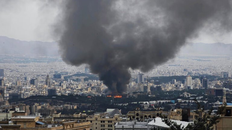 Launching Tomahawk missiles from American warships towards targets in Iran.