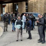 Gunman killed in shooting at synagogue in Michigan