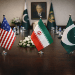 Between supporting de-escalation and insisting on compensation, how does the UAE view the Washington-Tehran talks in Islamabad?