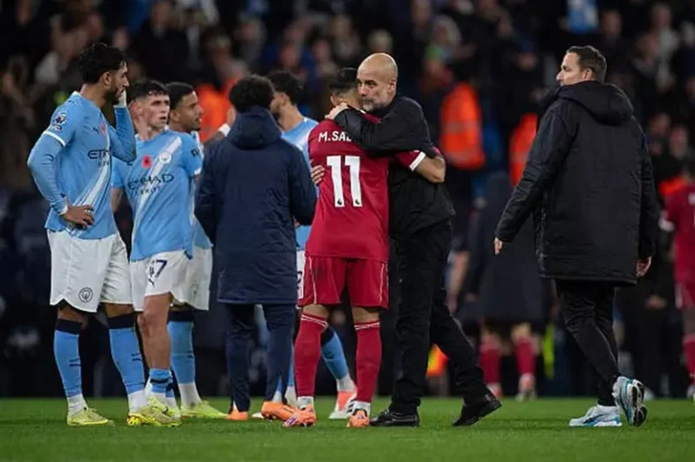 Guardiola and Mohamed Salah