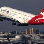 Australian airline Qantas raises fuel cost forecast and postpones share buyback due to Middle East tensions