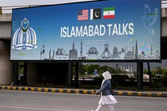 Conflicting reports emerge regarding frozen assets; Washington denies claims, while Tehran confirms "signs of a breakthrough" in Islamabad