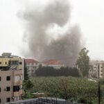 An Israeli airstrike on southern Lebanon kills eight Syrians and increases tensions on the border