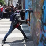 Ahead of the World Cup, Mexican police break up a teachers' protest near the fan zone