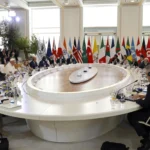 Behind-the-scenes conversations spark controversy... Open microphones expose discussions among G7 leaders