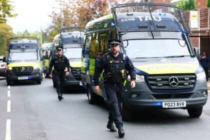 British police detain activist Tommy Robinson at Heathrow Airport under anti-terrorism laws