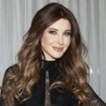 نانسي عجرم تُشوّق جمهورها لحفل دبي.. وتطلب منهم اختيار الأغنيات