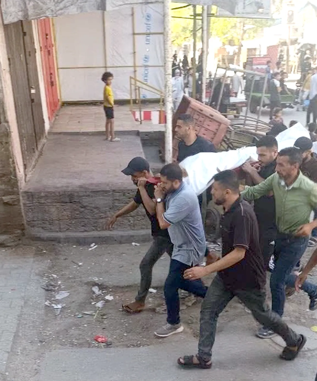 Palestinian condemnation of the bombing of mourners at a funeral in Nuseirat… and the National Council describes it as a “war crime”