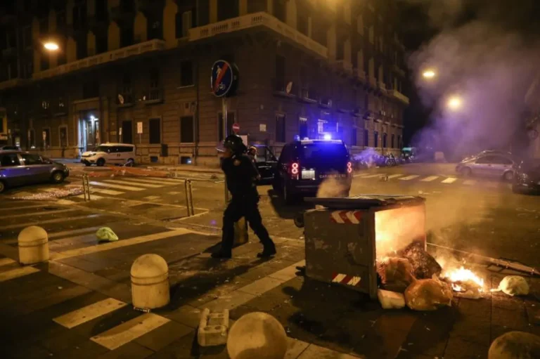 Dozens of police officers injured in violent clashes during protests in northern Italy
