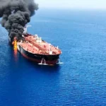 A commercial ship ran aground off the coast of Oman after being targeted by a projectile