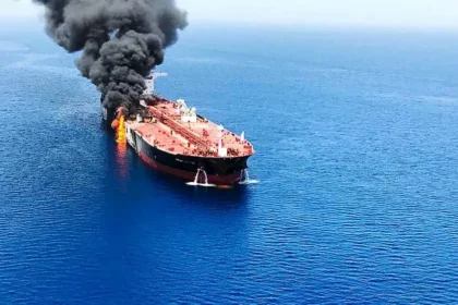 A commercial ship ran aground off the coast of Oman after being targeted by a projectile