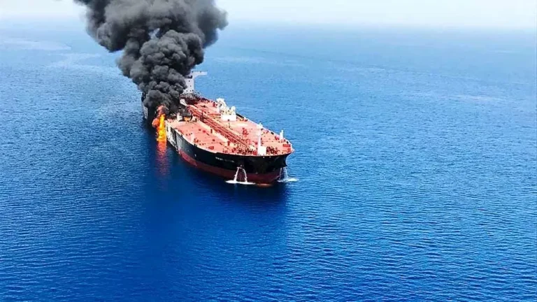 A commercial ship ran aground off the coast of Oman after being targeted by a projectile