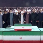 Mustafa, Masoud and Meysam Khamenei perform funeral prayers in front of the coffins