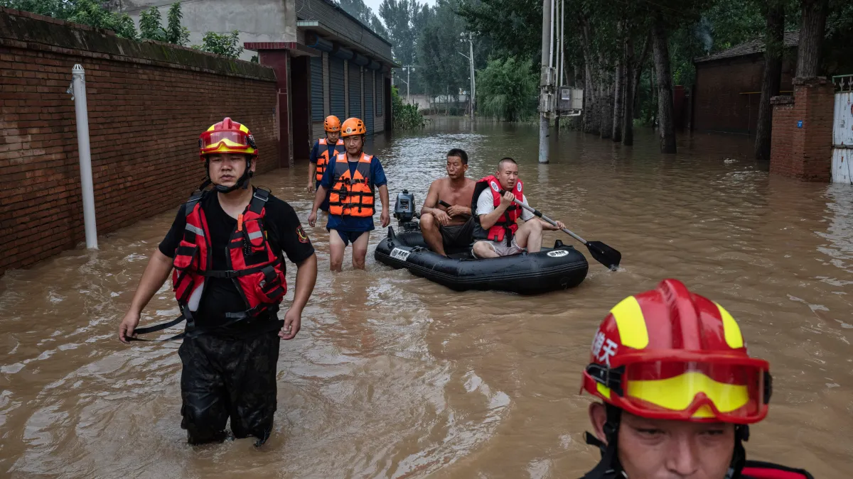 China Deadly Floods Rescue Operations Save Thousands Amid Storms