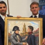 Macron receives an art gift from Millie that evokes a meeting between Napoleon and Saint Martin