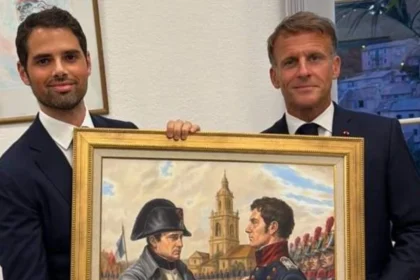 Macron receives an art gift from Millie that evokes a meeting between Napoleon and Saint Martin