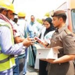 The third edition of the "Al-Freij Refrigerator" initiative.. Dubai Residence distributes 58,000 packages of cold water, juices and ice cream to workers