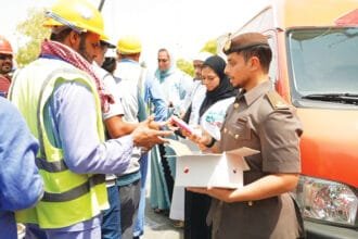The third edition of the "Al-Freij Refrigerator" initiative.. Dubai Residence distributes 58,000 packages of cold water, juices and ice cream to workers