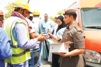 The third edition of the "Al-Freij Refrigerator" initiative.. Dubai Residence distributes 58,000 packages of cold water, juices and ice cream to workers