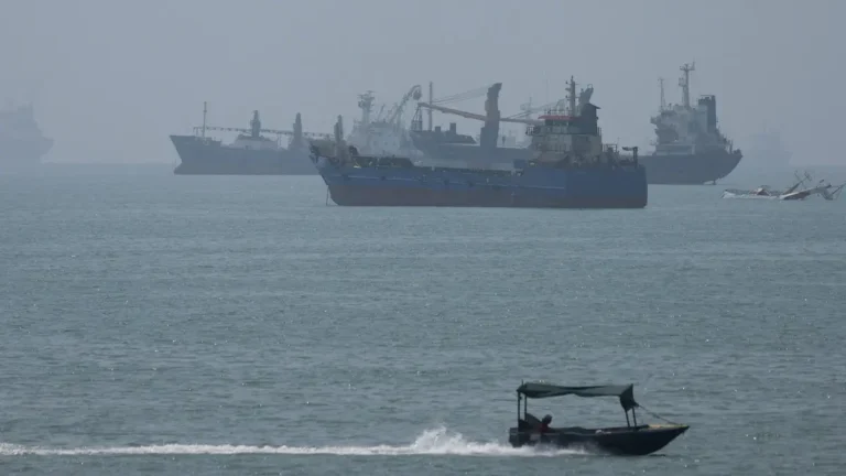 Crew of a commercial vessel evacuated after being struck by an unidentified projectile in the Strait of Hormuz